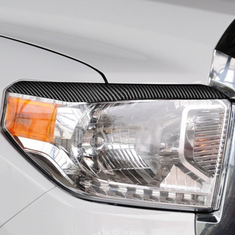 2 PCS / Set Carbon Fiber Car Headlight Eyebrow Decorative Sticker for Toyota Tundra 2014-2018, Left Right Driving, Headlight Eyebrow