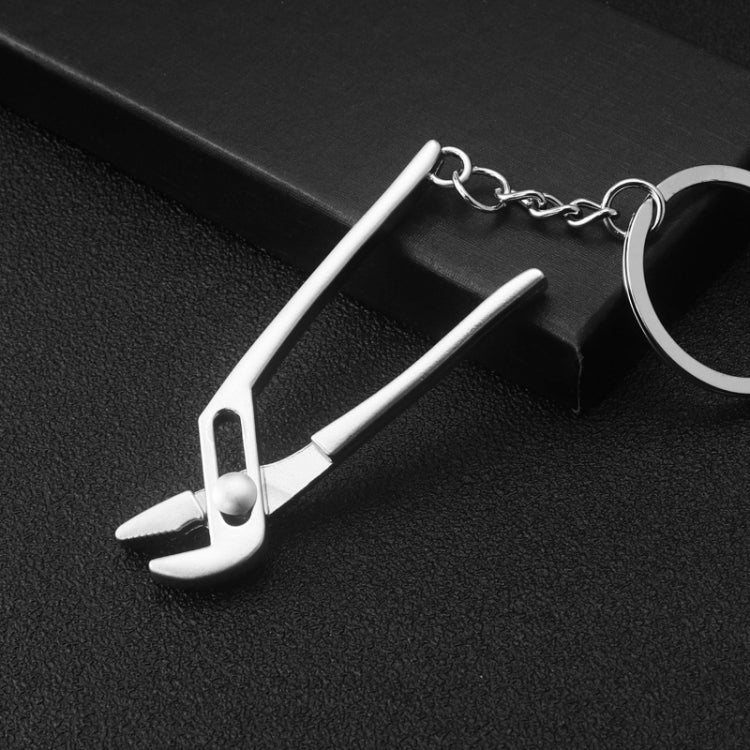 10 PCS Tool Metal Keychain Car Key Ring Pendant, H-540 Activity Wrench, H-389 Hex Wrench, H-391 Glossy Ax, H-388 Thread Ax, H-395 Double Head Wrench, H-405 Double Row Saw, H-402 Hand Saw, H-541 Crooked Nose Pliers, H-399 Pliers, X-396 Vise, H-556 Shove...