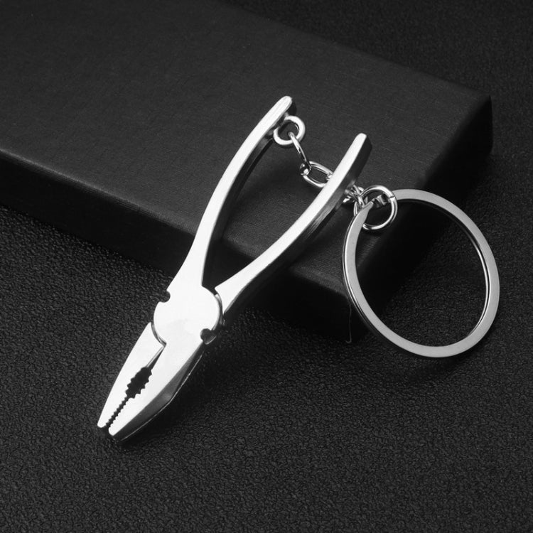 10 PCS Tool Metal Keychain Car Key Ring Pendant, H-540 Activity Wrench, H-389 Hex Wrench, H-391 Glossy Ax, H-388 Thread Ax, H-395 Double Head Wrench, H-405 Double Row Saw, H-402 Hand Saw, H-541 Crooked Nose Pliers, H-399 Pliers, X-396 Vise, H-556 Shove...