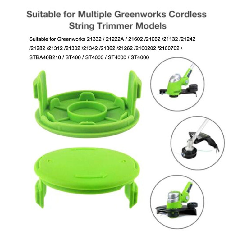 قطعتان من غطاء بكرة جزازة العشب اللاسلكية GK04 من Greenworks، باللونين الأخضر والأسود