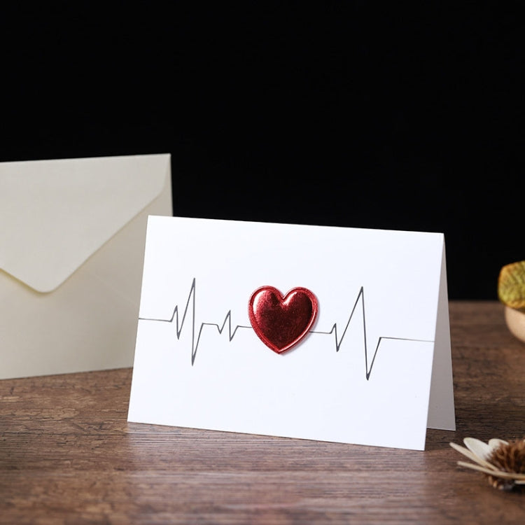 بطاقة تهنئة عيد الحب على شكل قلب ثلاثي الأبعاد مع رسائل تهنئة ومظاريف وتخطيط كهربية القلب وشعار "أنا أحبك" وبالون ونخلة