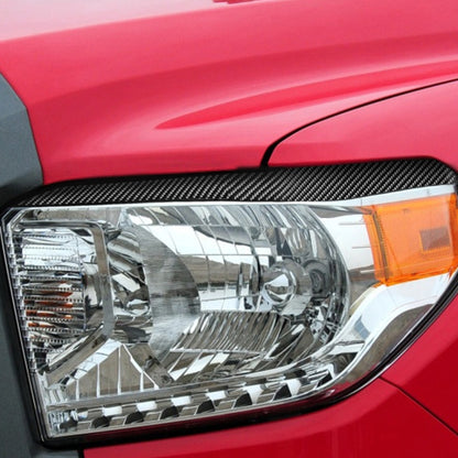 2 PCS / Set Carbon Fiber Car Headlight Eyebrow Decorative Sticker for Toyota Tundra 2014-2018, Left Right Driving, Headlight Eyebrow