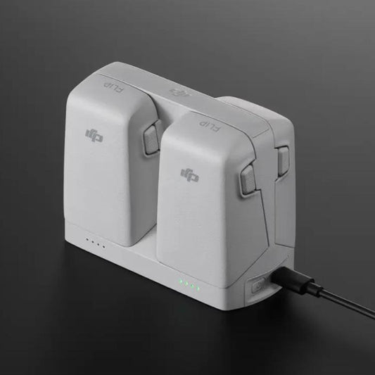 وحدة الشحن المتوازية الأصلية DJI Flip يمكنها تخزين وشحن بطاريتين، وحدة الشحن المتوازية Flip